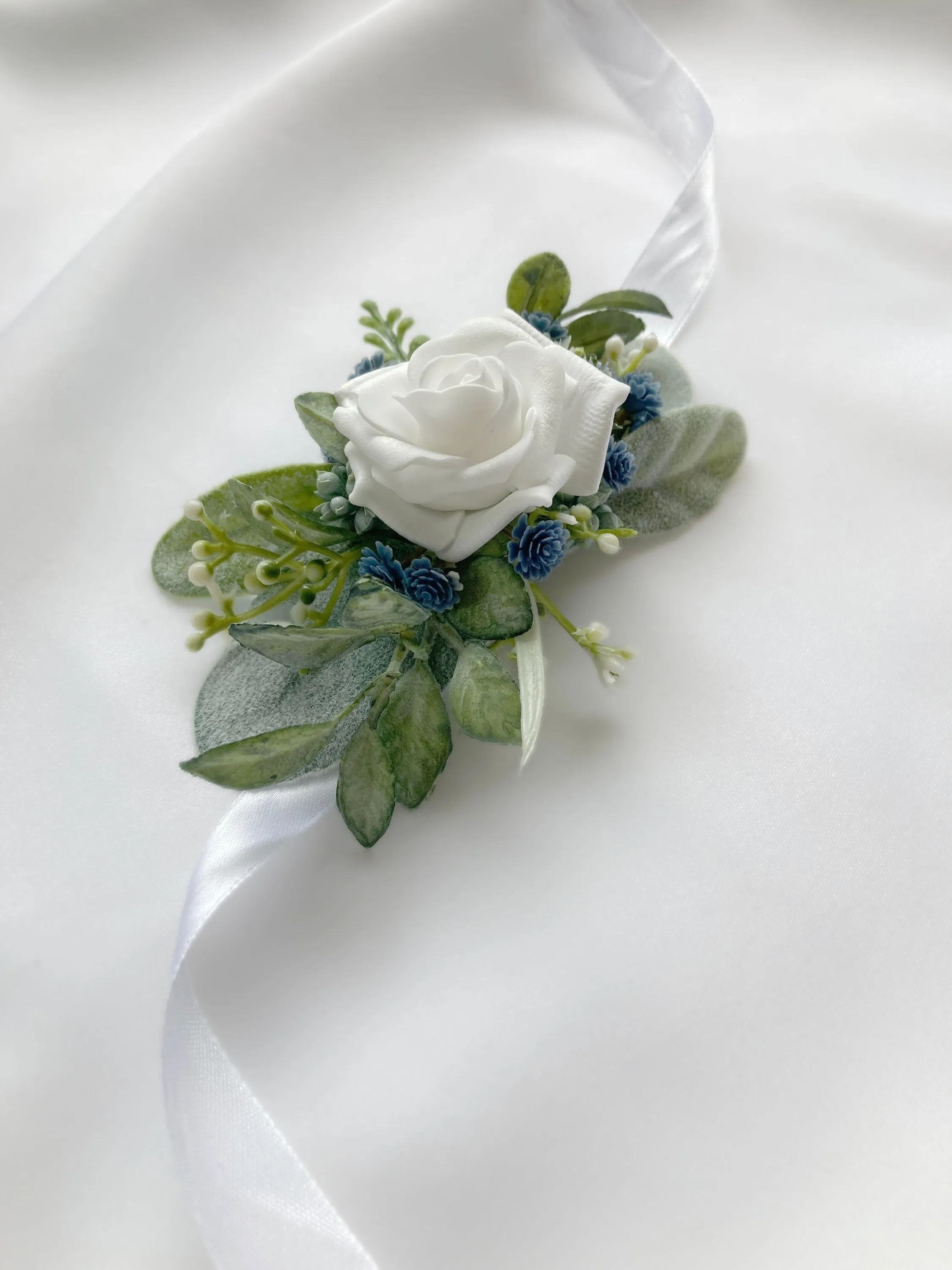 Dusty Blue   White Wrist Corsage