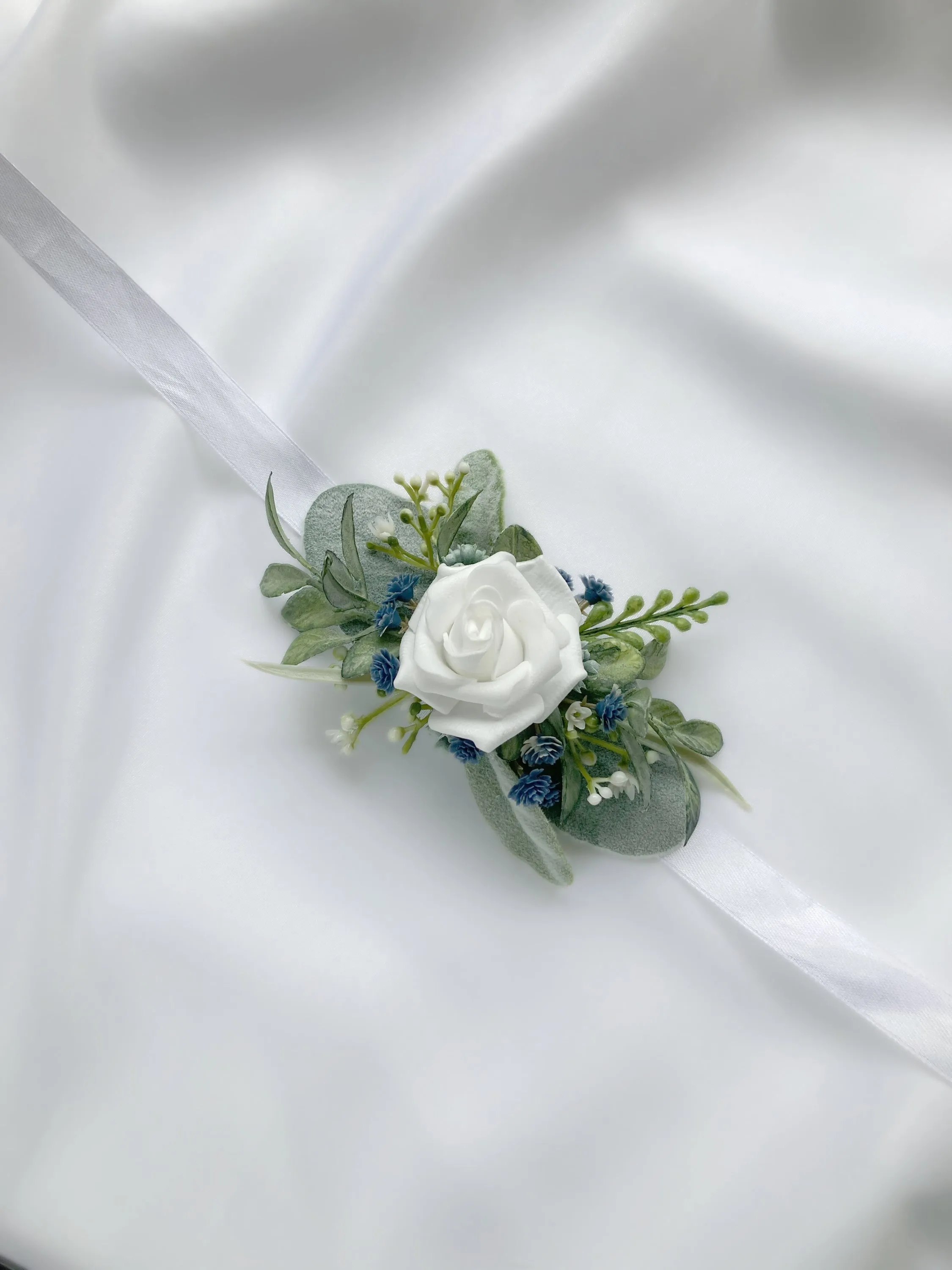Dusty Blue   White Wrist Corsage