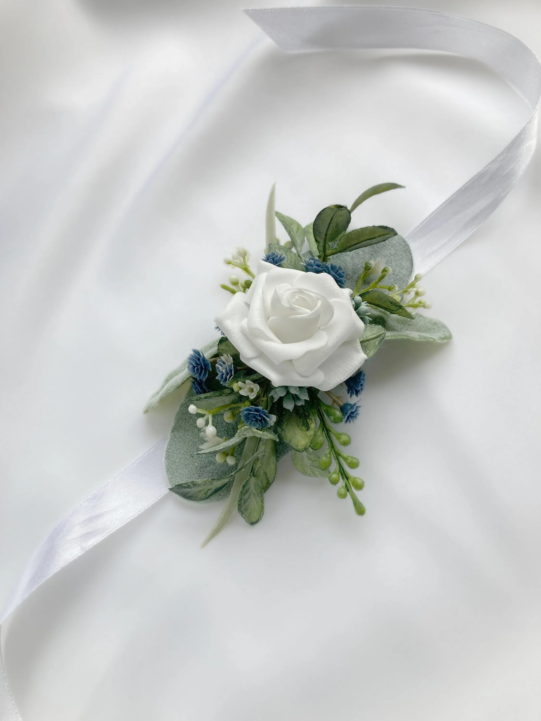 Dusty Blue   White Wrist Corsage