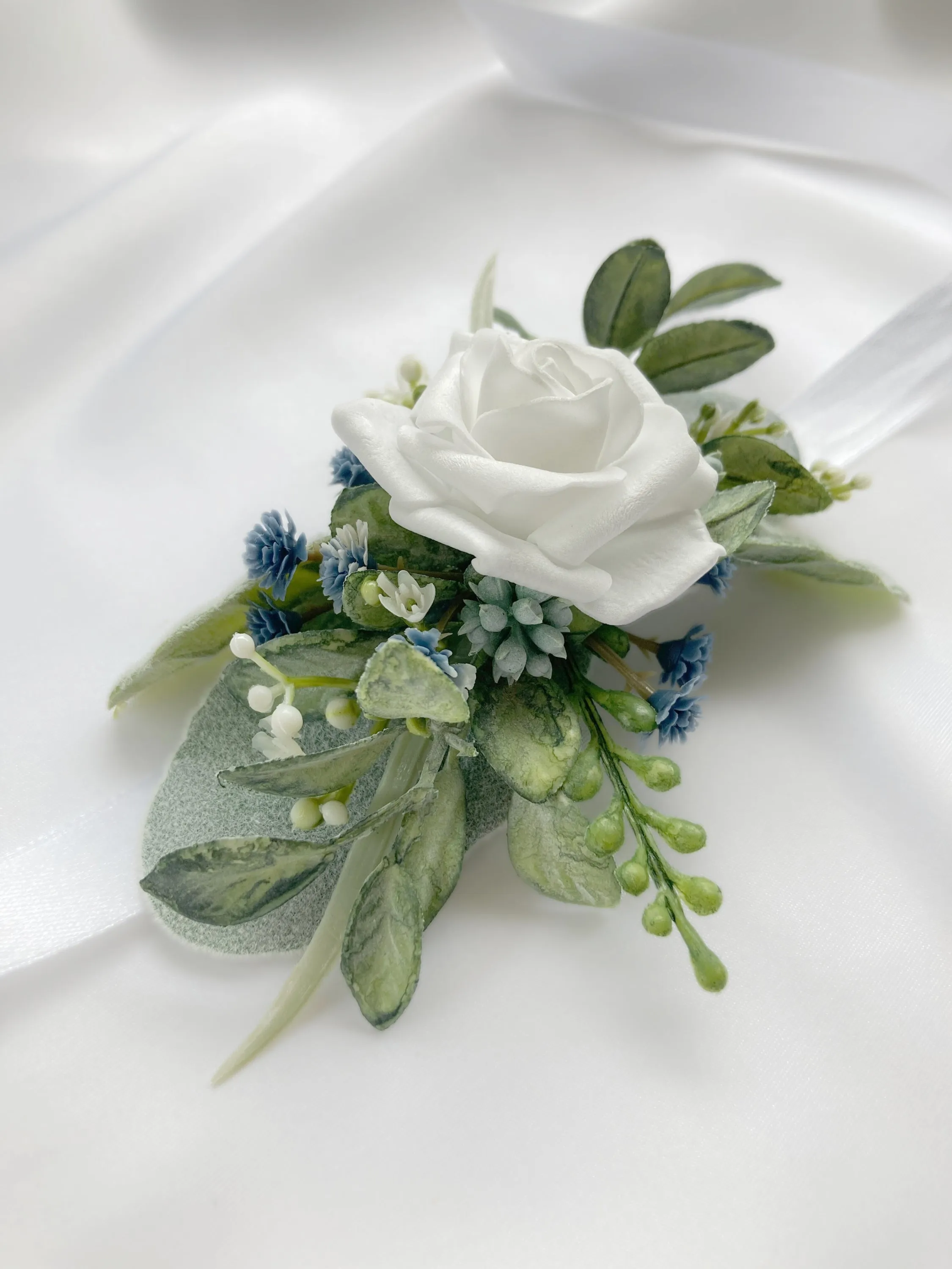 Dusty Blue   White Wrist Corsage