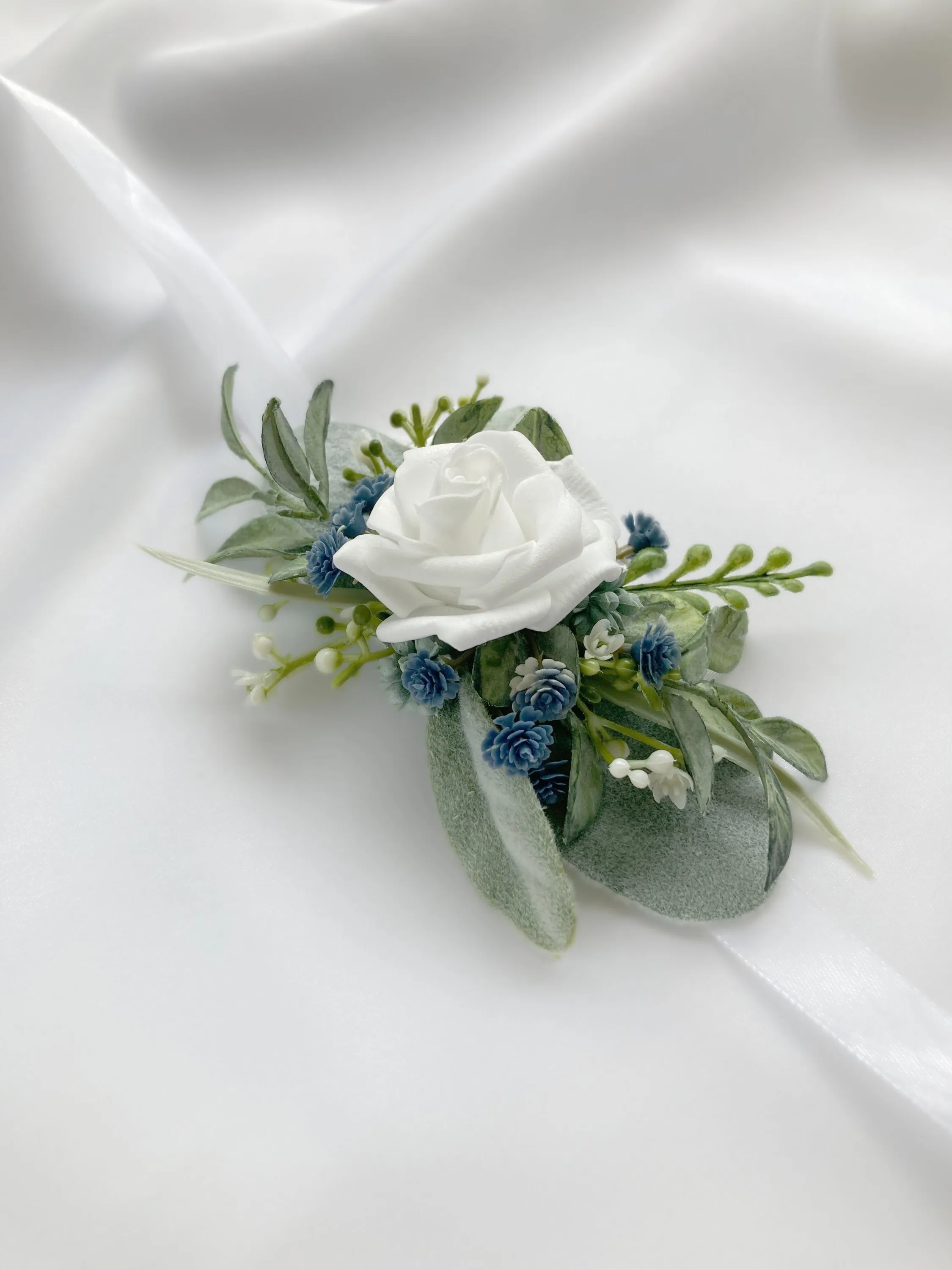Dusty Blue   White Wrist Corsage
